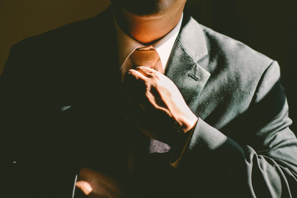 Photo by <a href="https://unsplash.com/@spiritvisionstudios?utm_content=creditCopyText&utm_medium=referral&utm_source=unsplash">Ben Rosett</a> on <a href="https://unsplash.com/photos/a-man-in-a-black-suit-loosening-his-tie-WdJkXFQ4VHY?utm_content=creditCopyText&utm_medium=referral&utm_source=unsplash">Unsplash</a>
      